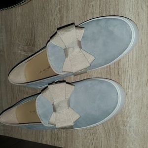 NWOT  MichealKors leather slip ons. 7